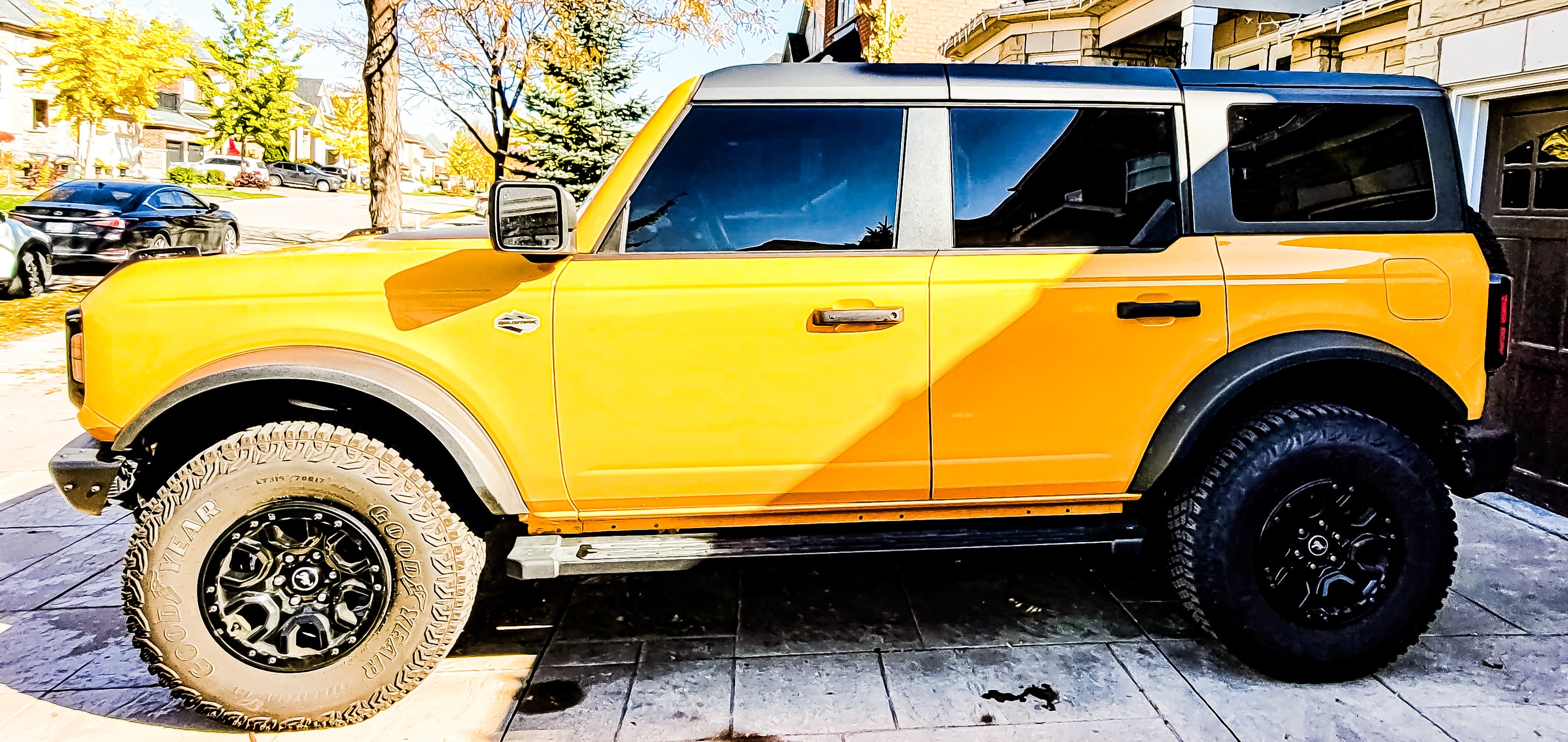 Yellow Bronco winth beautiful ceramic window tinting installed by Car Tint, the best window tinting shop near me. Car window tinting near me, mobile window tinting near me, we offer precision application, superior UV protection, Car Tint, auto window tinting near me, vehicle window tinting near me, window tint